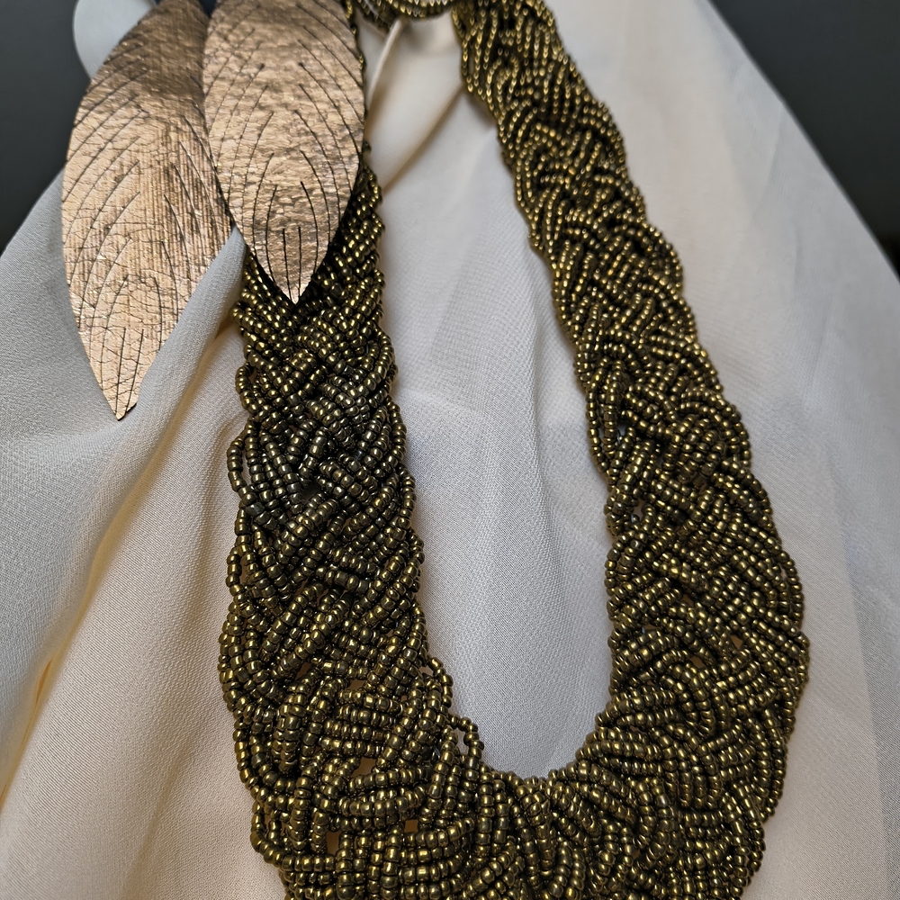 4pc Gold Braided Necklace with Leaf Accent. Mixed Textiles